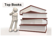 Figure holding a sign which reads top books next to pile of books