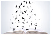 Image of open book with letters exploding upwards