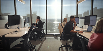 ASX staff at their desks