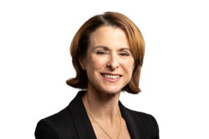 Head-and-shoulders professional portrait of Diona Raw wearing a blazer and light top, facing the camera against a plain light background
