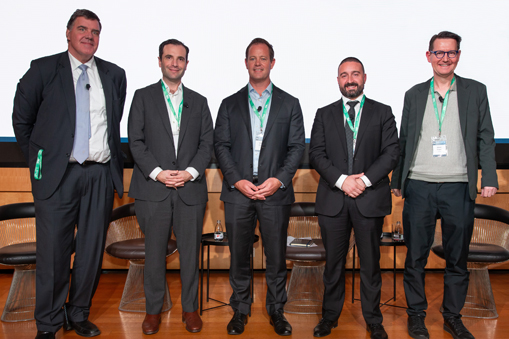 Group of people standing in formal business attire