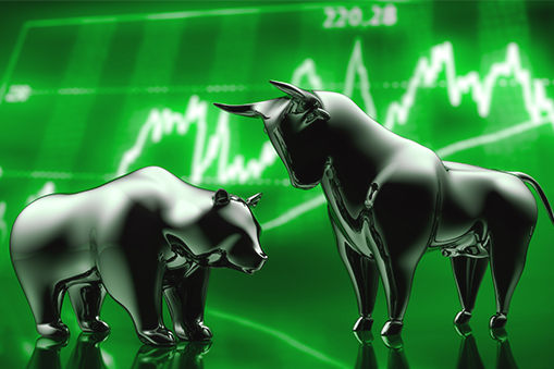 Metal bull and bear on green background with chart