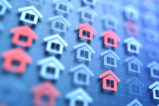 The image shows an abstract grid of red and blue houses