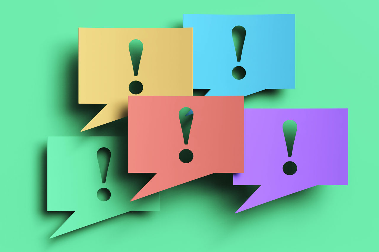 The image shows five overlapping speech bubbles, each containing a bold exclamation mark. 