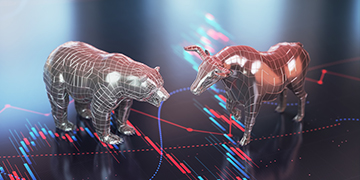 Digital bull and bear over stock chart