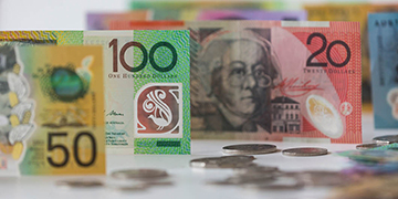 Australian banknotes and scattered coins