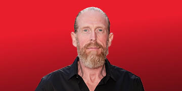 NEXTDC CEO Craig Scroggie on a red and black gradient background