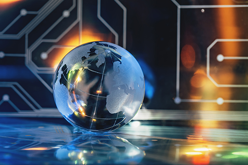 Glass globe with futuristic digital circuit background