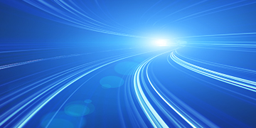 Abstract digital background featuring curved lines and light trails in shades of blue, converging towards a bright central point on a dark blue gradient backdrop